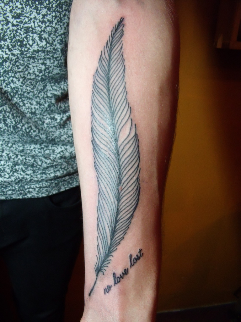 Religious Arm Tattoos For Men Feather arm classic tattoo